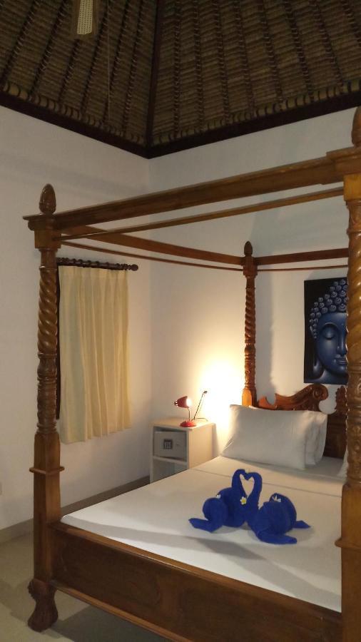 אמד Jemeluk Beach Bungalows מראה חיצוני תמונה