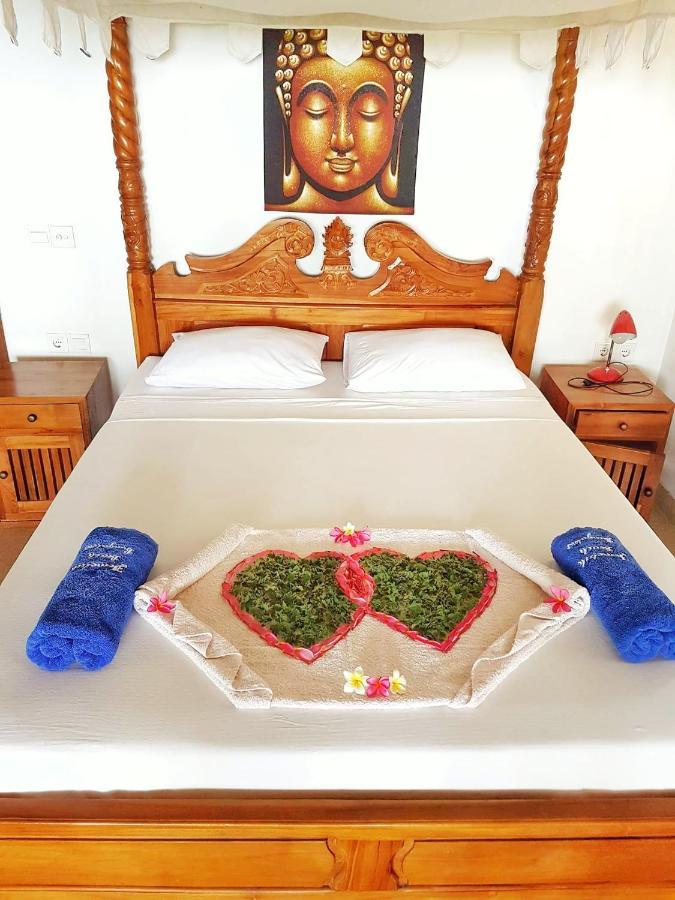 אמד Jemeluk Beach Bungalows מראה חיצוני תמונה